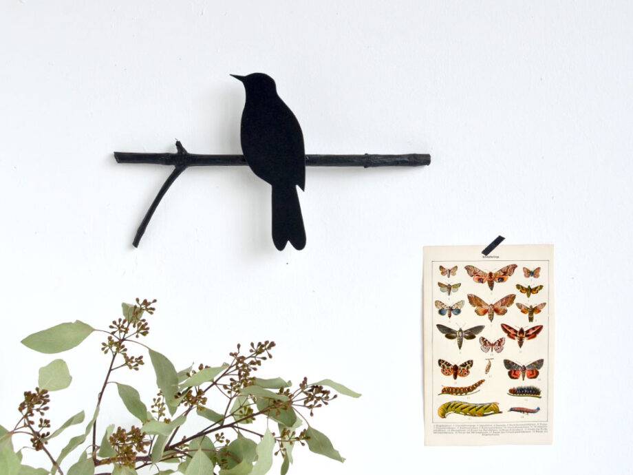 Renna Deluxe Amsel in Fraktur auf dem Ast Rabatt