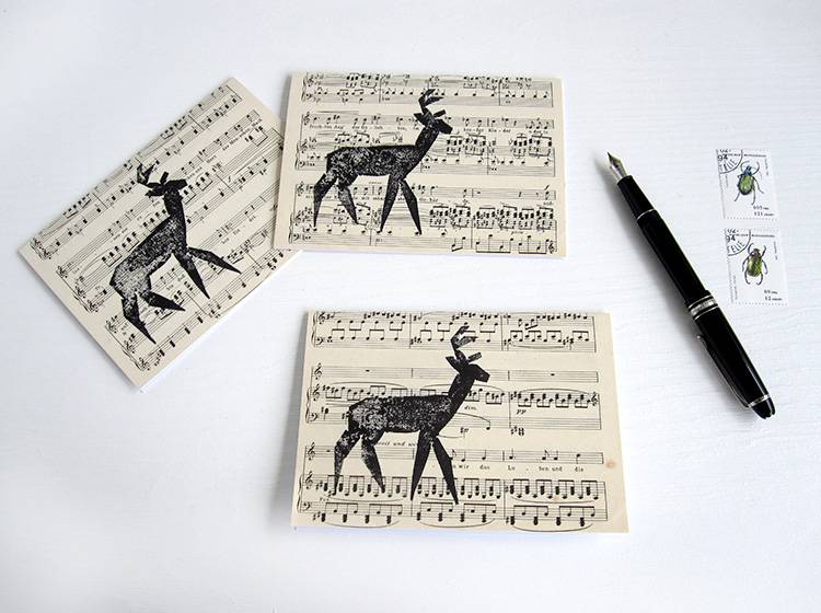 Renna Deluxe Klappkarte mit Hirsch auf Notenpapier Auslauf