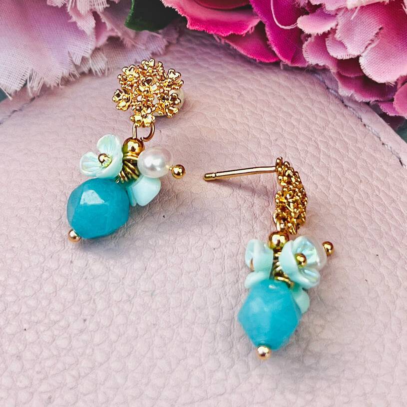 SchwesterSchwester Kleine vergoldete Ohrstecker mit Blüten und Perle in Türkis Günstig kaufen