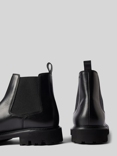 Peek & Cloppenburg BOSSChelsea Boots aus Leder mit Zugschlaufe Modell 'Julyo' in black Sonderangebot